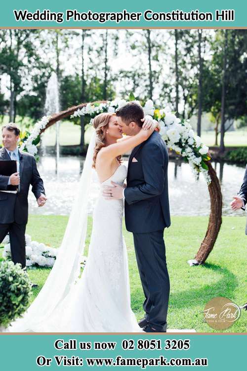 Photo of the Bride and the Groom kissing Constitution Hill NSW 2145