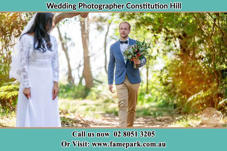 Photo of the Groom bringing flower to the Bride Constitution Hill NSW 2145