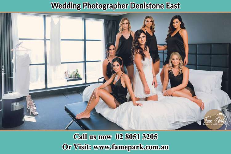 Photo of the Bride and the bridesmaids wearing lingerie on bed Denistone East NSW 2112