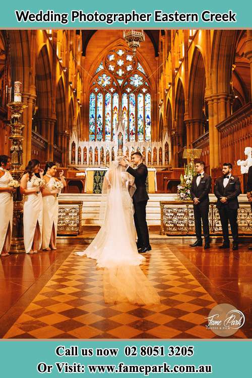 Photo of the Groom and the Bride with the entourage at the altar Eastern Creek NSW 2766