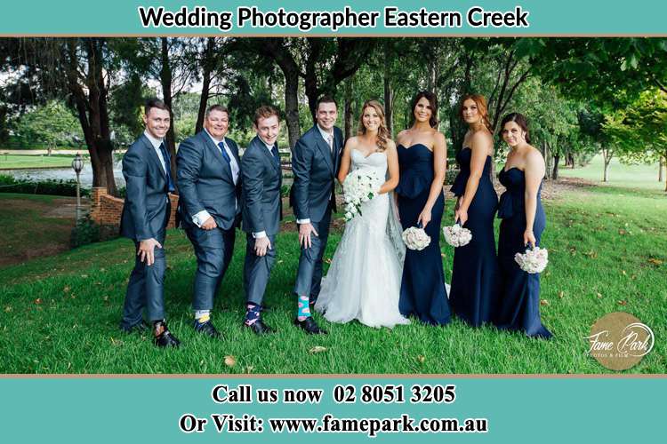 The Bride and the Groom with their entourage pose for the camera Eastern Creek NSW 2766