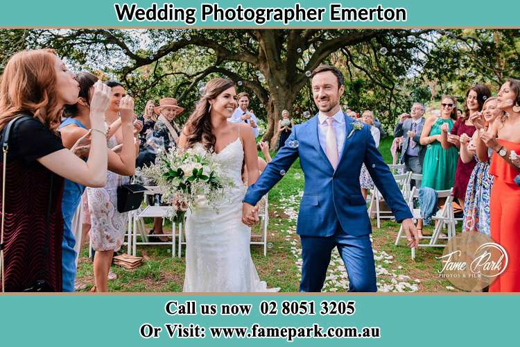 Photo of the Bride and the Groom showering bubbles by the visitors Emerton NSW 2770