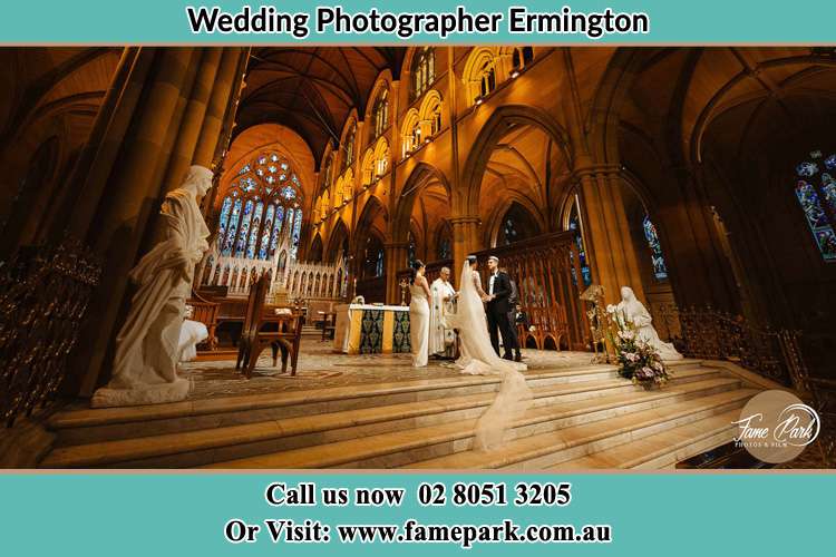 Photo of the Bride and the Groom at the altar Ermington NSW 2115