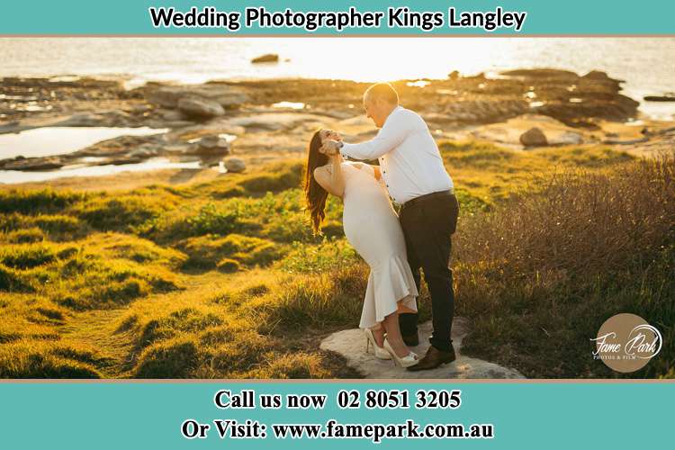 Photo of the Bride and the Groom dancing near the lake Kings Langley NSW 2147