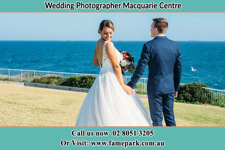 Photo of the Bride and the Groom holding hands at the yard Macquarie Centre NSW 2113