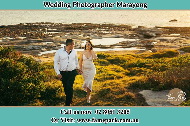 Photo of the Groom and the Bride walking near the lake Marayong NSW 2148