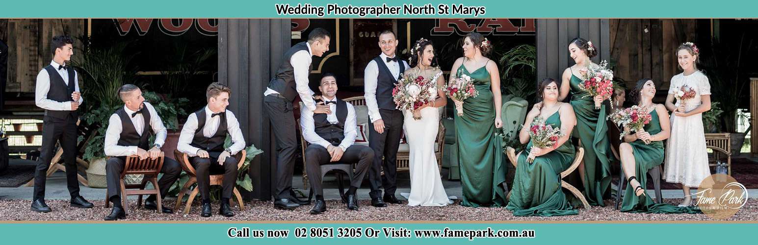 The Bride and the Groom with their entourage pose for the camera North St Marys NSW 2760