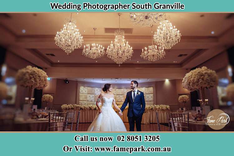 Photo of the Bride and the Groom holding hands on the dance floor South Granville NSW 2142