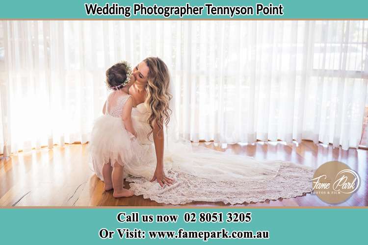 Photo of the Bride kiss the flower girl Tennyson Point NSW 2111