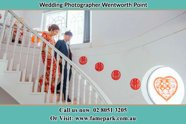 Photo of the Bride and the Groom going down the stair Wentworth Point NSW 2127